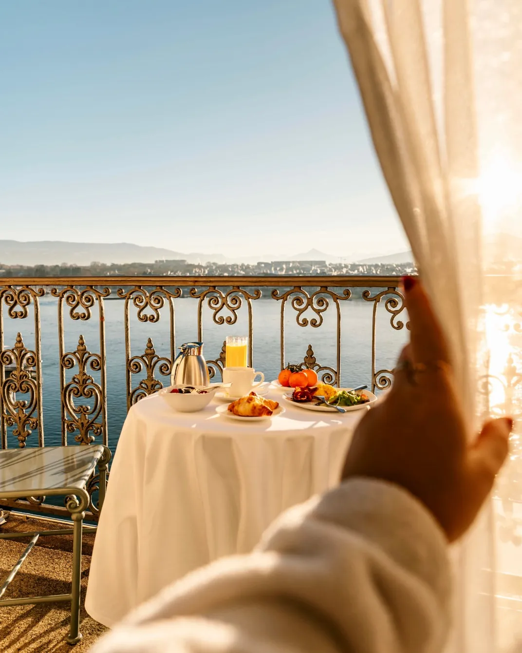 Water-view rooms with attention to window light and seating